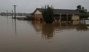 Thousands more flee as Sydney floods track north
