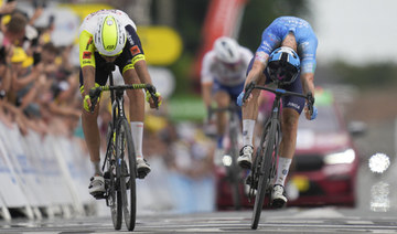 Cobble king Clarke rules Tour de France stage five with bike throw