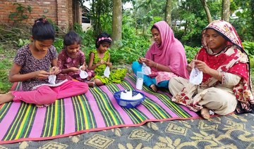 In rural Bangladesh, women earn self-reliance with hand-knitted Muslim prayer caps