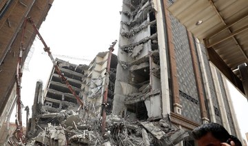 Iran charges 20 over deadly building collapse