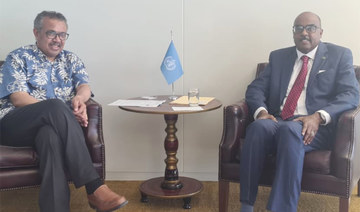 Tarig Ali Bakhiet, meets the director general of the World Health Organization, Dr. Tedros Adhanom Ghebreyesus, in Geneva. 