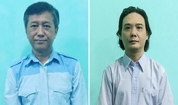 Democracy activist Kyaw Min Yu (L) and former lawmaker Maung Kyaw. (AFP file photo)