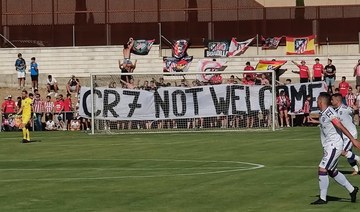 Atletico Madrid fans display “CR7 Not Welcome” banner during friendly match