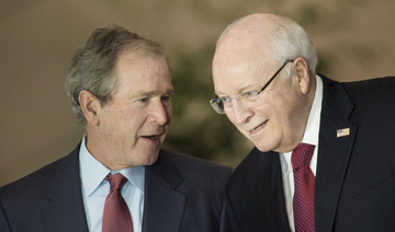 Former US President George W. Bush (L) and Vice President Dick Cheney talk on December 3, 2015 in Washington, DC. (AFP)