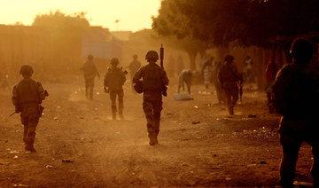 In this file photo taken on December 04, 2021 French soldiers patrol the streets of Gao. (AFP)