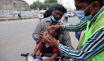Gunmen kill 2 policemen escorting polio workers in Pakistan