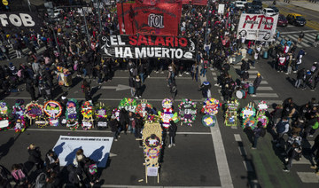 Argentine workers hold funeral for wages as inflation eats up value of paychecks