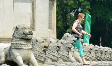 A tourist walks through Sri Lanka's Independence Memorial Hall in Colombo. (AFP file photo)
