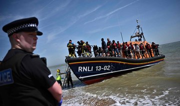 Record number of migrants arrive in Britain in boat crossings on a single day