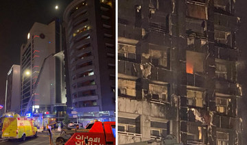 Families flee as fire breaks out in a 12-floor apartment building in Dubai