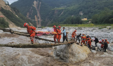 Downpours and mudslides hamper China earthquake rescue mission