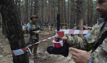 Ukraine says mass grave found in Izium where Russians were ousted days ago