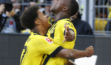 Dortmund go top as Bayern stunned away at Augsburg