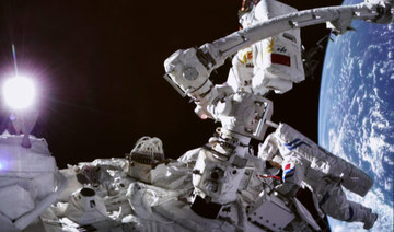 Chinese astronauts go on spacewalk from new station