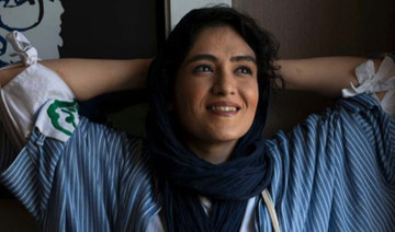 Rights watchdog condemns arrest of Iranian photojournalist