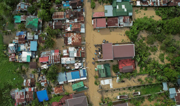 Power cuts, heavy floods in northern Philippines after powerful typhoon