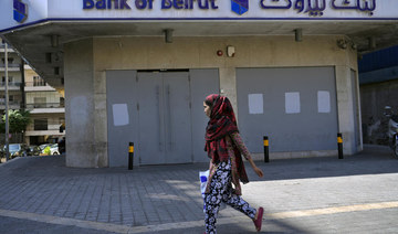 Lebanese banks reopen partially after weeklong closure