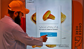 In wealthy Dubai, poor get free bread from machines