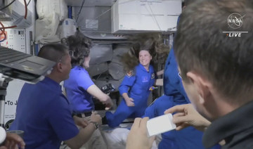 Latest 4-member SpaceX crew, including cosmonaut, welcomed aboard space station