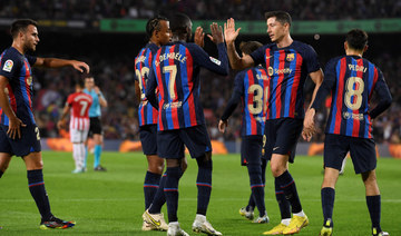 Barcelona on brink of exit, Messi shines at PSG