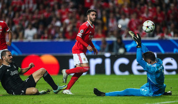 Benfica win thriller with Juventus to reach Champions League knockouts