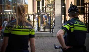 Climate activists target ‘Girl with a Pearl Earring’: Dutch museum