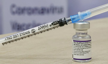This photo shows a syringe and vial of the Pfizer-BioNTech vaccine against the coronavirus. (AFP)