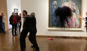 Protesters pour black liquid on Klimt masterpiece in Vienna