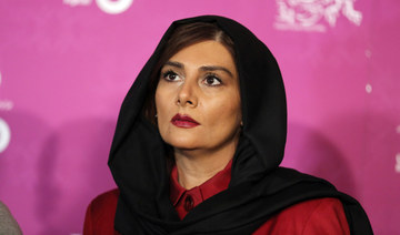 Iranian actors arrested for public removal of headscarves
