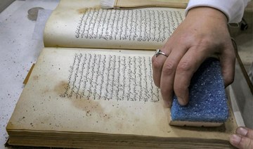Iraqi conservators strive to preserve ancient manuscripts