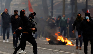 Kurdish protest over Paris shooting turns violent