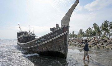 At least 20 reported dead as Rohingya boats land in Indonesia