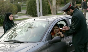 Iran issues warning on mandatory headscarf in cars: Media