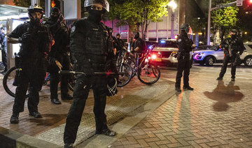 Portland police stand guard in Portland, United States. (AFP file photo)