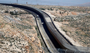 Israel building concrete wall to protect highways near Gaza Strip