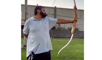 Former Saudi national guardsman adds string to bow with archery medals