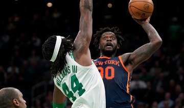 Knicks edge Celtics in overtime thriller, Doncic hurt in Mavs win
