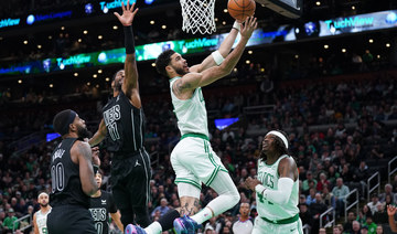Tatum leads Celtic rout of Nets, Sixers bounce back against Magic