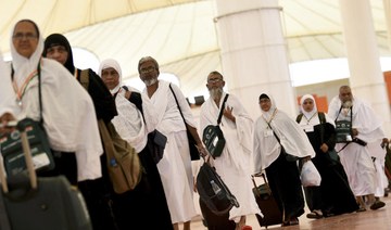 Muslim Indian pilgrims wait at Jeddah airport prior to the start of the annual Hajj pilgrimage in Makkah. (File/AFP)