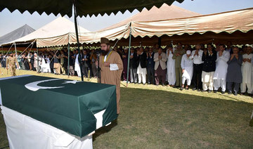 People attend the funeral prayer of Pakistan’s former President Pervez Musharraf, in Karachi. (AP)