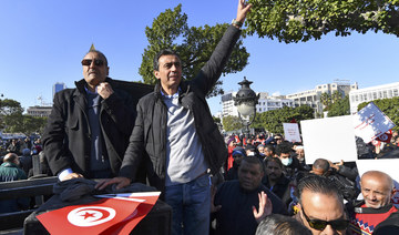 Tunisia detains critic of president in crackdown
