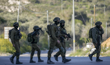 Israeli soldiers operate in village of Sarra near the Palestinians West Bank city of Nablus, Sunday, March 12, 2023. (AP)