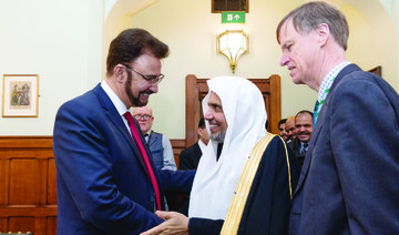Dr. Mohammed bin Abdulkarim Al-Issa meets with officials in London. (Supplied)
