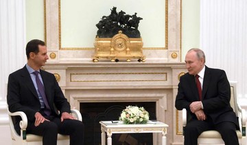 Russian President Vladimir Putin meets with his Syrian counterpart Bashar Al-Assad at the Kremlin in Moscow on March 15, 2023. 