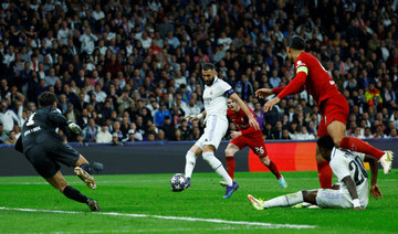 Real Madrid defeat Liverpool to reach Champions League quarterfinals