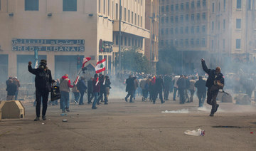 Tear gas, clashes as Lebanon protesters try to storm government HQ
