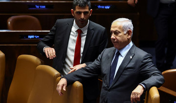 Israeli Prime Minister Benjamin Netanyahu attends a meeting at the Knesset, Israel’s parliament, in Jerusalem amid protests