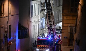 French building collapse kills 6, gas explosion suspected