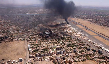 This video grab taken from AFPTV video footage on April 20, 2023, shows an aerial view of black smoke rising above Khartoum. 
