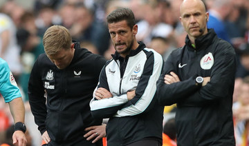 Newcastle United manager Eddie Howe and assistant manager Jason Tindall during the defeat to Arsenal. (Reuters)